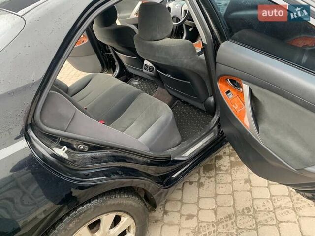 Черный Тойота Камри, объемом двигателя 2.4 л и пробегом 181 тыс. км за 9200 $, фото 7 на Automoto.ua