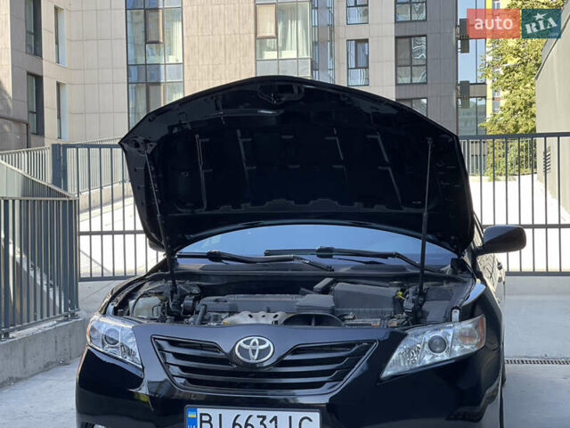 Черный Тойота Камри, объемом двигателя 2.36 л и пробегом 275 тыс. км за 6999 $, фото 42 на Automoto.ua