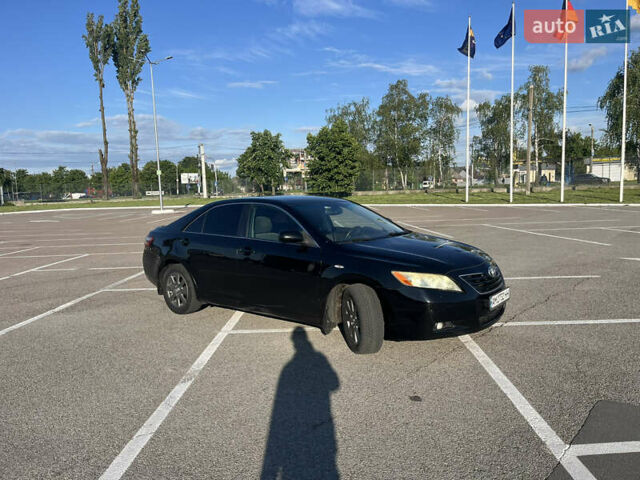 Черный Тойота Камри, объемом двигателя 2.36 л и пробегом 332 тыс. км за 7900 $, фото 1 на Automoto.ua