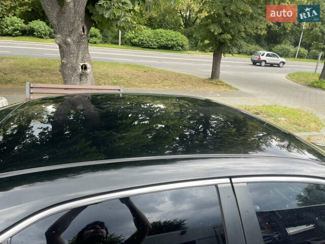 Чорний Тойота Камрі, об'ємом двигуна 2.4 л та пробігом 230 тис. км за 8499 $, фото 21 на Automoto.ua