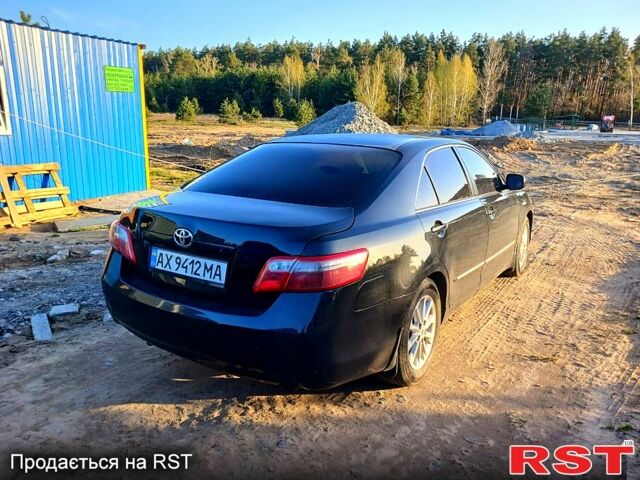Черный Тойота Камри, объемом двигателя 2.4 л и пробегом 220 тыс. км за 8500 $, фото 1 на Automoto.ua