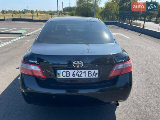 Чорний Тойота Камрі, об'ємом двигуна 2.36 л та пробігом 228 тис. км за 8200 $, фото 8 на Automoto.ua