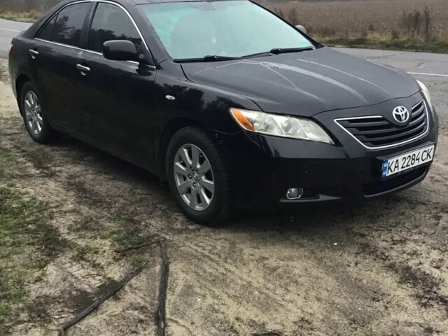Черный Тойота Камри, объемом двигателя 2.4 л и пробегом 363 тыс. км за 6500 $, фото 1 на Automoto.ua