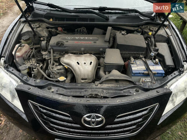 Черный Тойота Камри, объемом двигателя 2.36 л и пробегом 164 тыс. км за 8900 $, фото 28 на Automoto.ua
