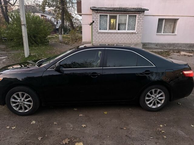 Черный Тойота Камри, объемом двигателя 2.4 л и пробегом 250 тыс. км за 7000 $, фото 3 на Automoto.ua