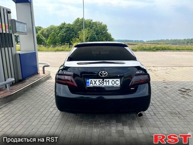 Черный Тойота Камри, объемом двигателя 2.4 л и пробегом 320 тыс. км за 8000 $, фото 2 на Automoto.ua