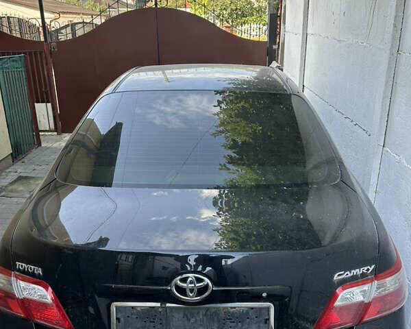 Чорний Тойота Камрі, об'ємом двигуна 2.36 л та пробігом 340 тис. км за 10500 $, фото 13 на Automoto.ua