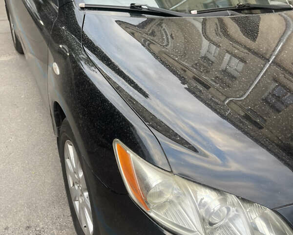 Чорний Тойота Камрі, об'ємом двигуна 2.4 л та пробігом 230 тис. км за 8499 $, фото 6 на Automoto.ua