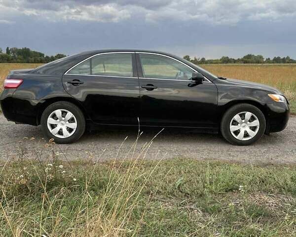 Черный Тойота Камри, объемом двигателя 2.4 л и пробегом 202 тыс. км за 9700 $, фото 2 на Automoto.ua