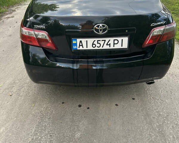 Черный Тойота Камри, объемом двигателя 2.4 л и пробегом 306 тыс. км за 8000 $, фото 8 на Automoto.ua