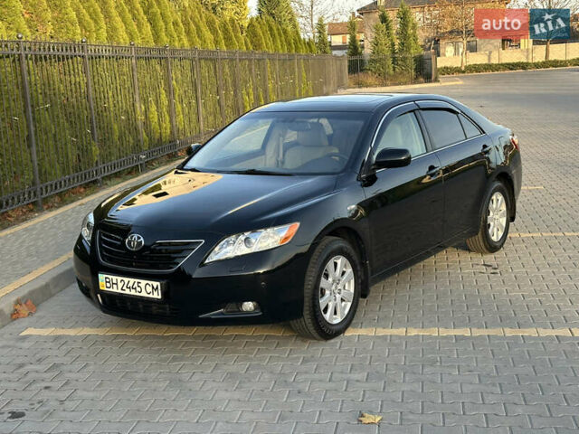 Черный Тойота Камри, объемом двигателя 2.4 л и пробегом 134 тыс. км за 11900 $, фото 1 на Automoto.ua