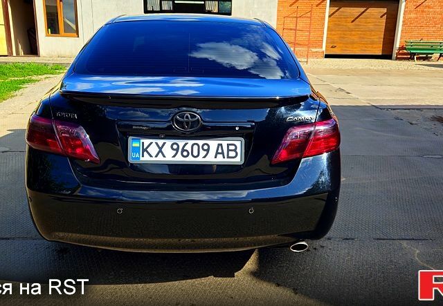 Черный Тойота Камри, объемом двигателя 2.4 л и пробегом 233 тыс. км за 8500 $, фото 4 на Automoto.ua