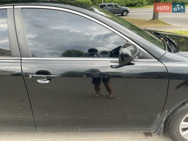 Чорний Тойота Камрі, об'ємом двигуна 2.4 л та пробігом 230 тис. км за 8499 $, фото 12 на Automoto.ua