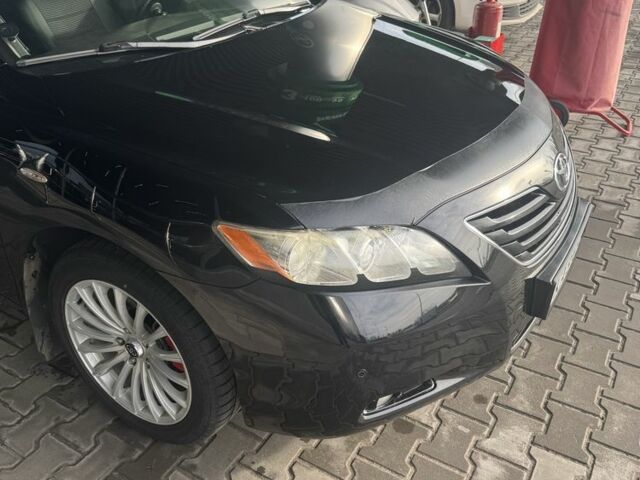 Черный Тойота Камри, объемом двигателя 2.4 л и пробегом 169 тыс. км за 8700 $, фото 2 на Automoto.ua