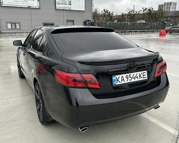 Черный Тойота Камри, объемом двигателя 3.46 л и пробегом 390 тыс. км за 11700 $, фото 1 на Automoto.ua
