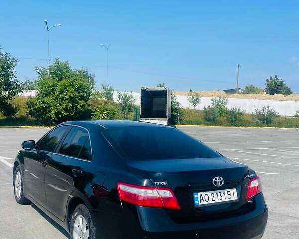 Черный Тойота Камри, объемом двигателя 2.36 л и пробегом 282 тыс. км за 7499 $, фото 1 на Automoto.ua