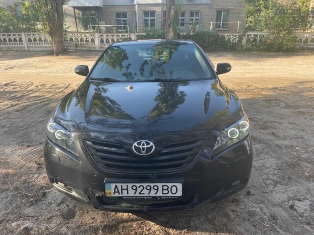 Черный Тойота Камри, объемом двигателя 2.4 л и пробегом 282 тыс. км за 5000 $, фото 1 на Automoto.ua