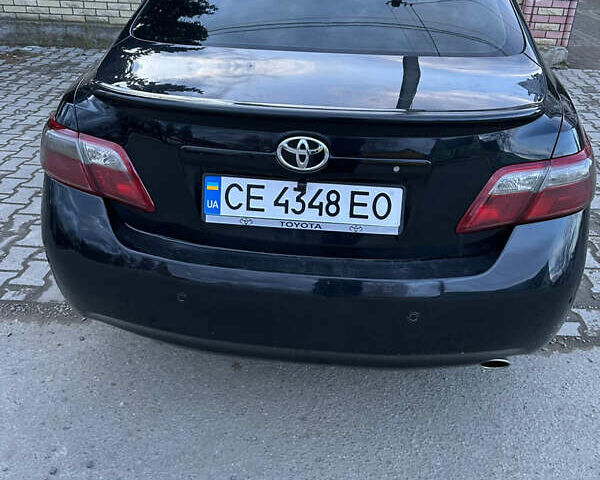 Черный Тойота Камри, объемом двигателя 2.36 л и пробегом 240 тыс. км за 9600 $, фото 2 на Automoto.ua