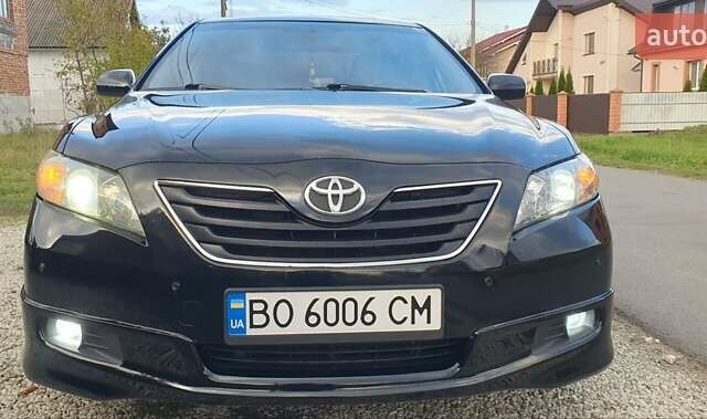 Черный Тойота Камри, объемом двигателя 2.4 л и пробегом 167 тыс. км за 8200 $, фото 7 на Automoto.ua