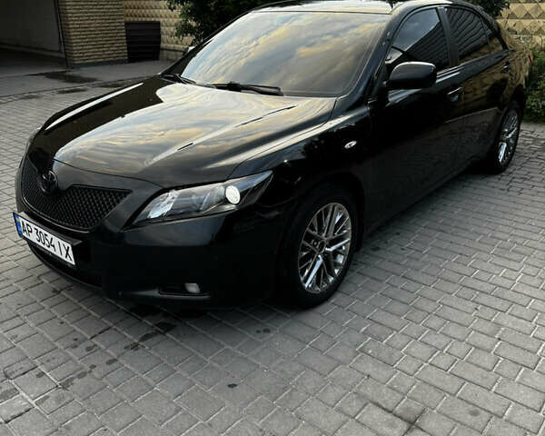 Чорний Тойота Камрі, об'ємом двигуна 3.46 л та пробігом 375 тис. км за 7500 $, фото 3 на Automoto.ua