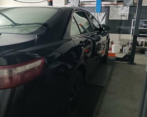 Черный Тойота Камри, объемом двигателя 3.46 л и пробегом 320 тыс. км за 8300 $, фото 2 на Automoto.ua