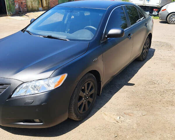 Черный Тойота Камри, объемом двигателя 2.4 л и пробегом 267 тыс. км за 8200 $, фото 2 на Automoto.ua