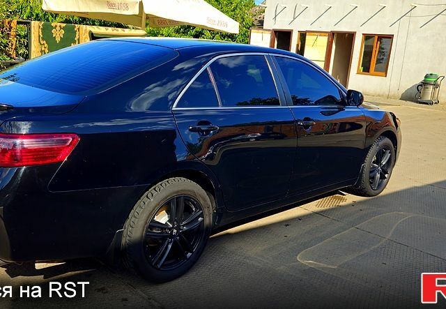 Черный Тойота Камри, объемом двигателя 2.4 л и пробегом 233 тыс. км за 8500 $, фото 6 на Automoto.ua