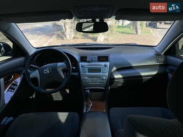 Черный Тойота Камри, объемом двигателя 2.4 л и пробегом 244 тыс. км за 8700 $, фото 14 на Automoto.ua