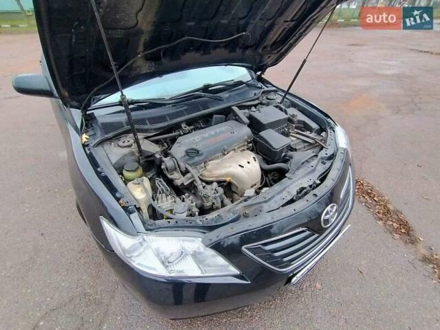 Черный Тойота Камри, объемом двигателя 2.4 л и пробегом 367 тыс. км за 7900 $, фото 15 на Automoto.ua