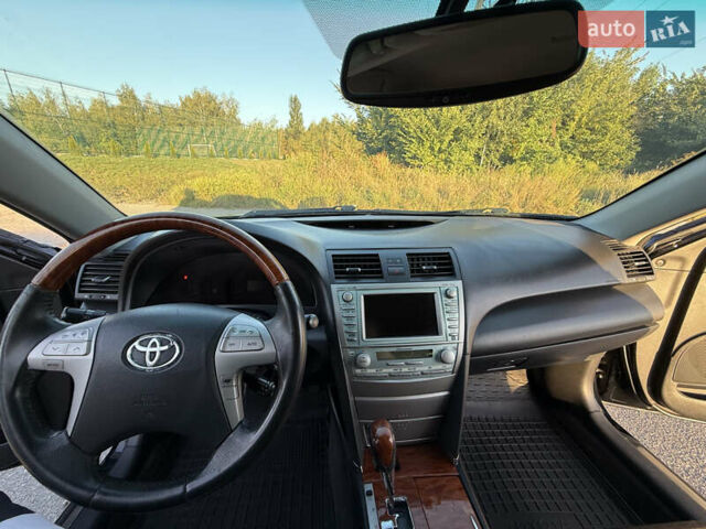 Черный Тойота Камри, объемом двигателя 3.5 л и пробегом 252 тыс. км за 9500 $, фото 4 на Automoto.ua