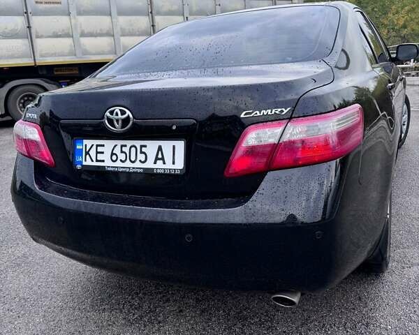Черный Тойота Камри, объемом двигателя 2.4 л и пробегом 240 тыс. км за 8700 $, фото 4 на Automoto.ua