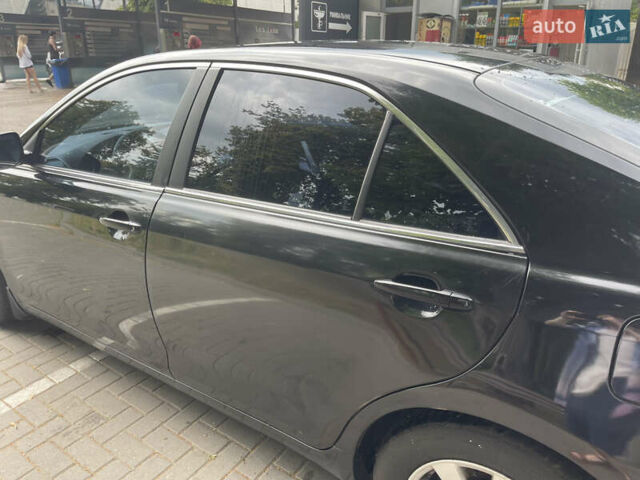 Чорний Тойота Камрі, об'ємом двигуна 2.4 л та пробігом 230 тис. км за 8499 $, фото 15 на Automoto.ua