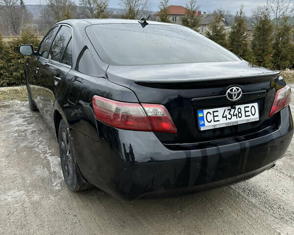 Черный Тойота Камри, объемом двигателя 2.36 л и пробегом 240 тыс. км за 9600 $, фото 4 на Automoto.ua