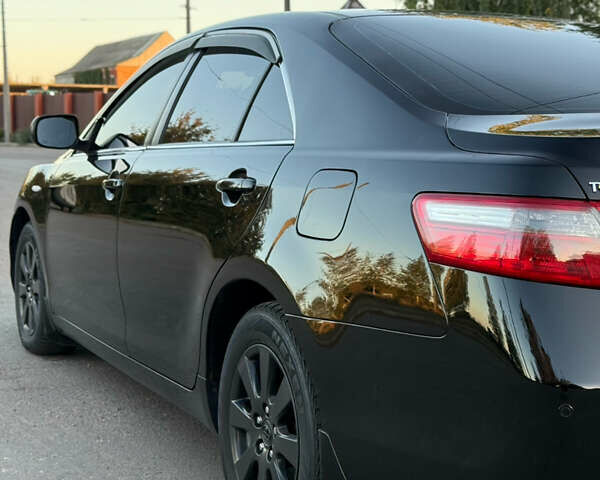 Чорний Тойота Камрі, об'ємом двигуна 3.46 л та пробігом 225 тис. км за 10300 $, фото 57 на Automoto.ua