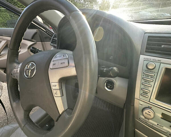 Черный Тойота Камри, объемом двигателя 2.4 л и пробегом 264 тыс. км за 9000 $, фото 9 на Automoto.ua