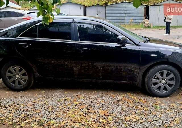 Черный Тойота Камри, объемом двигателя 2.36 л и пробегом 355 тыс. км за 7300 $, фото 6 на Automoto.ua