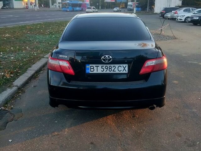 Черный Тойота Камри, объемом двигателя 2.4 л и пробегом 322 тыс. км за 7000 $, фото 2 на Automoto.ua