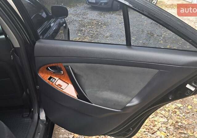 Черный Тойота Камри, объемом двигателя 2.36 л и пробегом 355 тыс. км за 7300 $, фото 14 на Automoto.ua