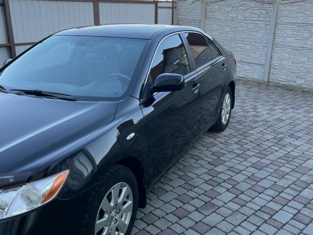 Черный Тойота Камри, объемом двигателя 2.4 л и пробегом 280 тыс. км за 8900 $, фото 1 на Automoto.ua