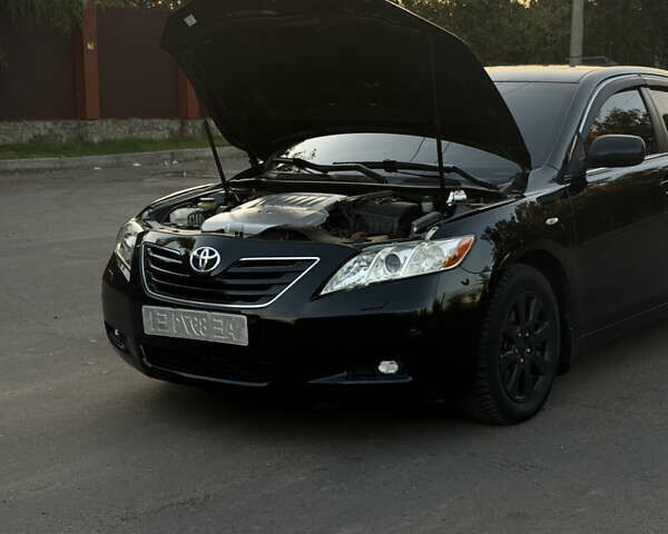 Чорний Тойота Камрі, об'ємом двигуна 3.46 л та пробігом 225 тис. км за 10300 $, фото 2 на Automoto.ua