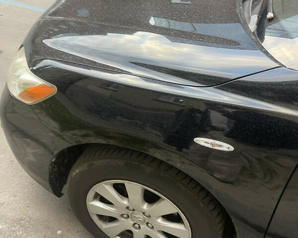 Чорний Тойота Камрі, об'ємом двигуна 2.4 л та пробігом 230 тис. км за 8499 $, фото 11 на Automoto.ua