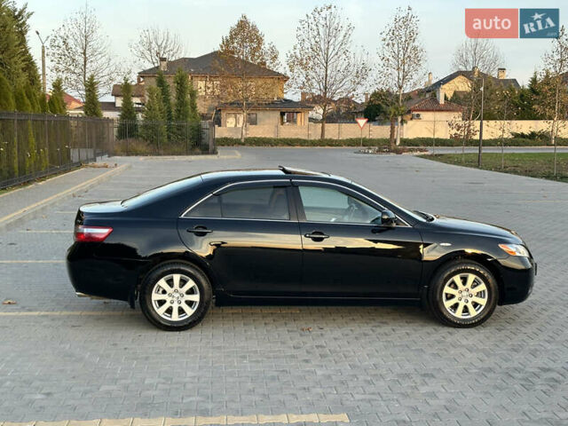 Черный Тойота Камри, объемом двигателя 2.4 л и пробегом 134 тыс. км за 11900 $, фото 32 на Automoto.ua