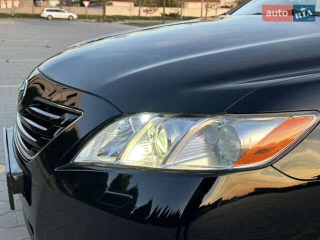 Черный Тойота Камри, объемом двигателя 2.4 л и пробегом 134 тыс. км за 11900 $, фото 46 на Automoto.ua
