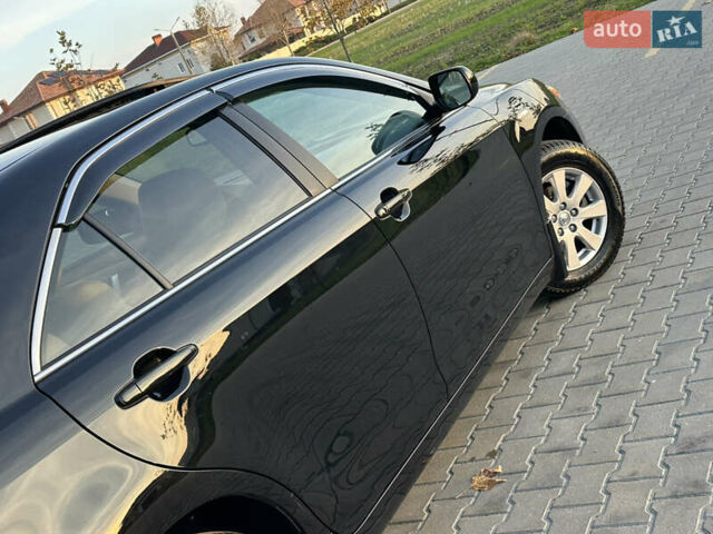 Черный Тойота Камри, объемом двигателя 2.4 л и пробегом 134 тыс. км за 11900 $, фото 20 на Automoto.ua