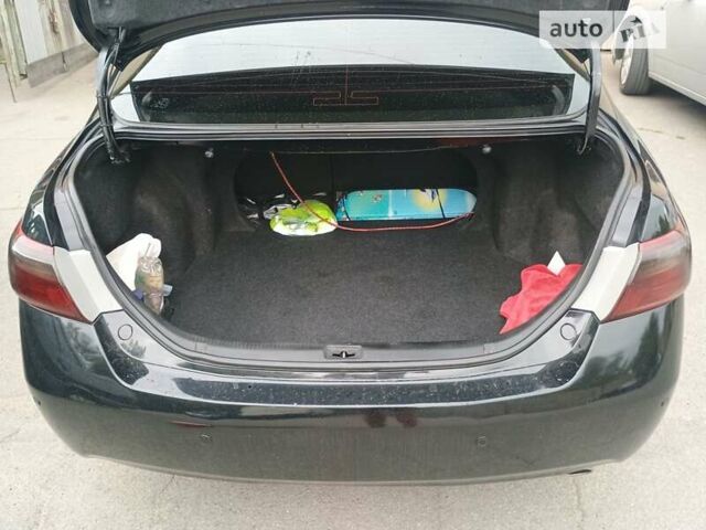 Чорний Тойота Камрі, об'ємом двигуна 2.36 л та пробігом 270 тис. км за 8800 $, фото 1 на Automoto.ua