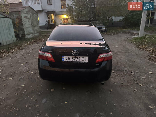 Чорний Тойота Камрі, об'ємом двигуна 2.36 л та пробігом 249 тис. км за 7000 $, фото 2 на Automoto.ua