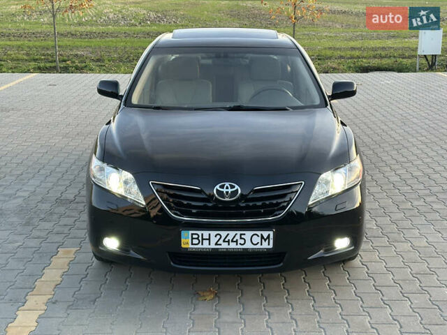 Черный Тойота Камри, объемом двигателя 2.4 л и пробегом 134 тыс. км за 11900 $, фото 43 на Automoto.ua