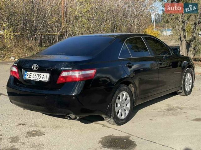 Черный Тойота Камри, объемом двигателя 2.4 л и пробегом 244 тыс. км за 8700 $, фото 6 на Automoto.ua