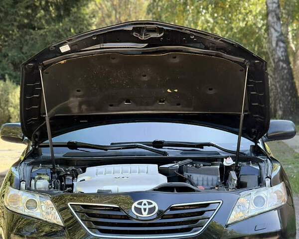 Чорний Тойота Камрі, об'ємом двигуна 3.46 л та пробігом 225 тис. км за 10300 $, фото 44 на Automoto.ua