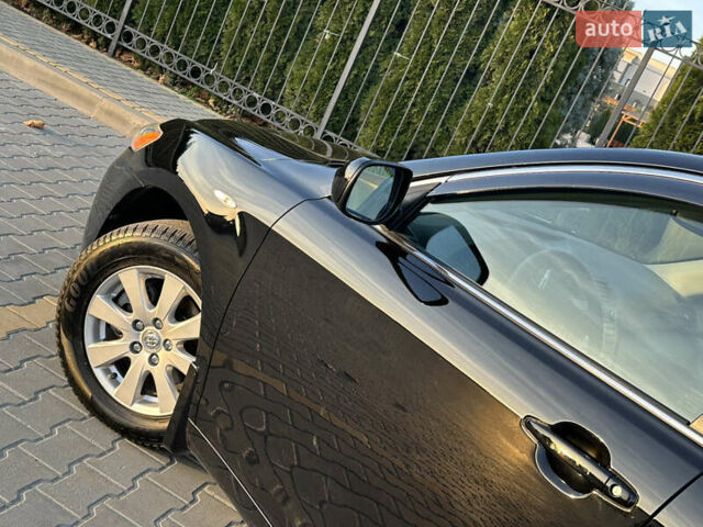 Черный Тойота Камри, объемом двигателя 2.4 л и пробегом 134 тыс. км за 11900 $, фото 12 на Automoto.ua